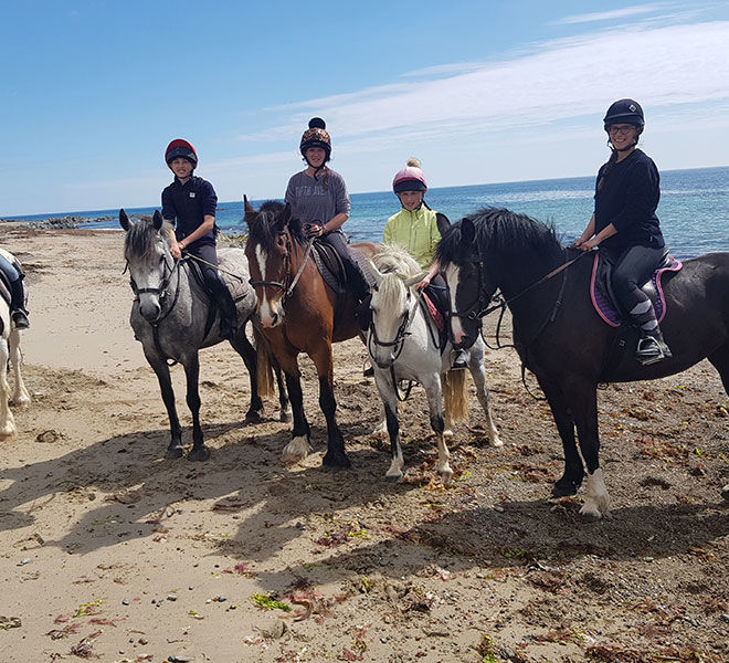 happy riders at the beach trek Wexford Ireland